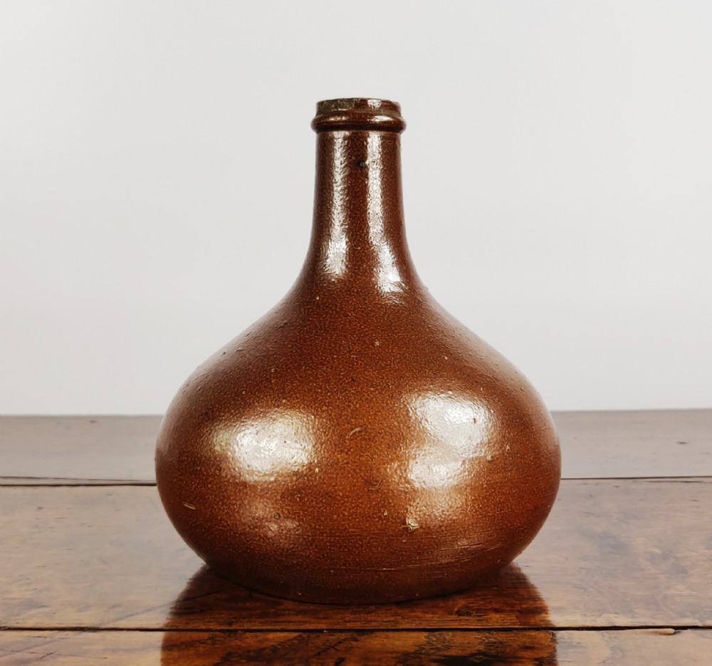 A 19th century Salt glazed onion bottle. 