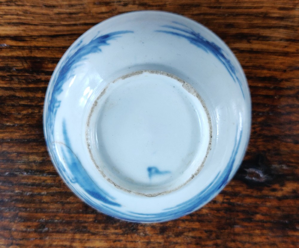 An early 18th century Chinese Delft tea bowl.  View X