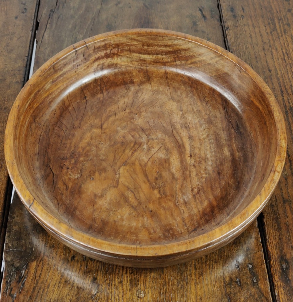 A large 19th century turned lignum vitae fruit bowl.