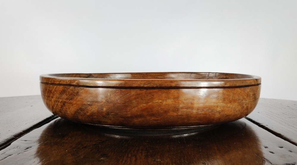 A large 19th century turned lignum vitae fruit bowl. View III