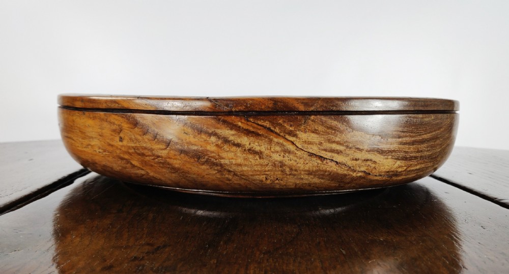 A large 19th century turned lignum vitae fruit bowl. View VI