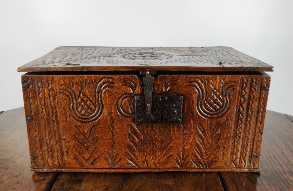A late 17th - early 18th century carved box.  View VIII