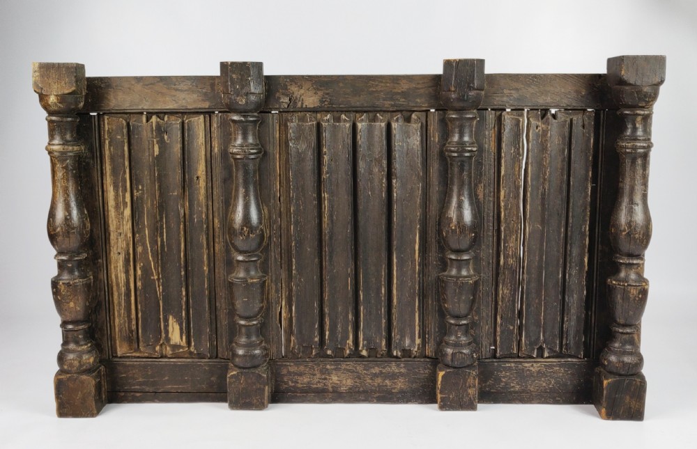 A large 17th century linenfold paneled section. 
