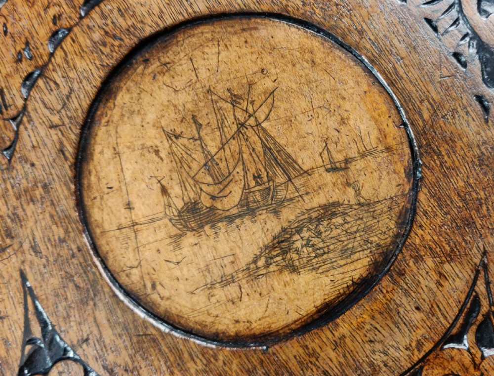 An unusual 18th century pen-work tea table.  View XV