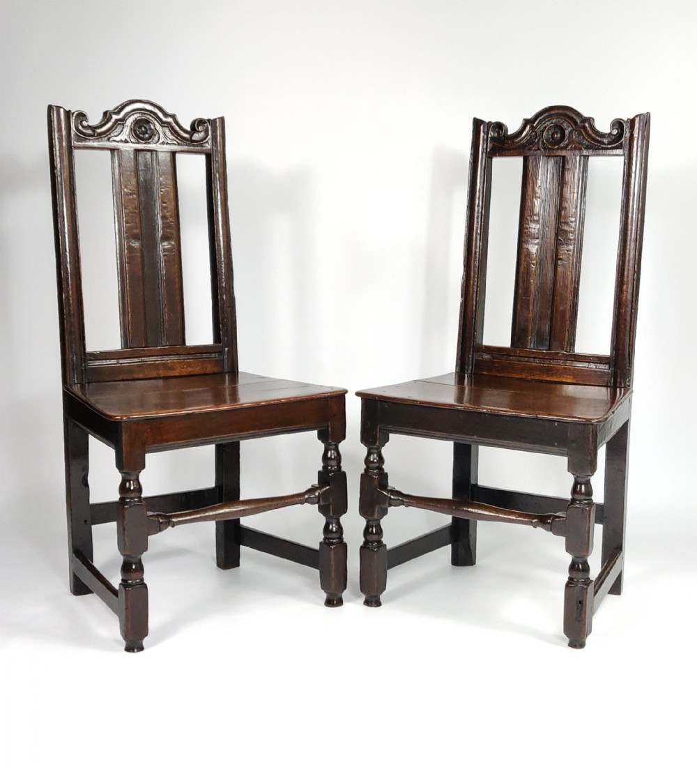 A pair of late 17th century chairs. 