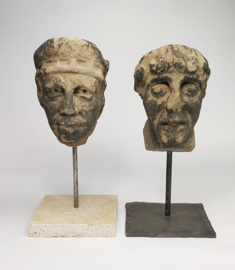 A pair of 14th century European stone heads. 