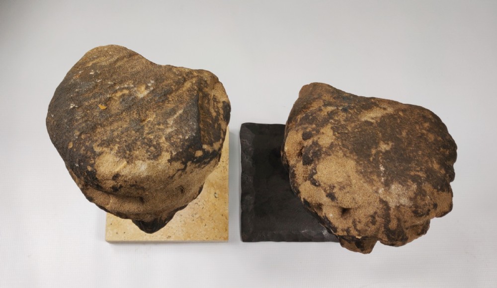 A pair of 14th century European stone heads.  View VIII