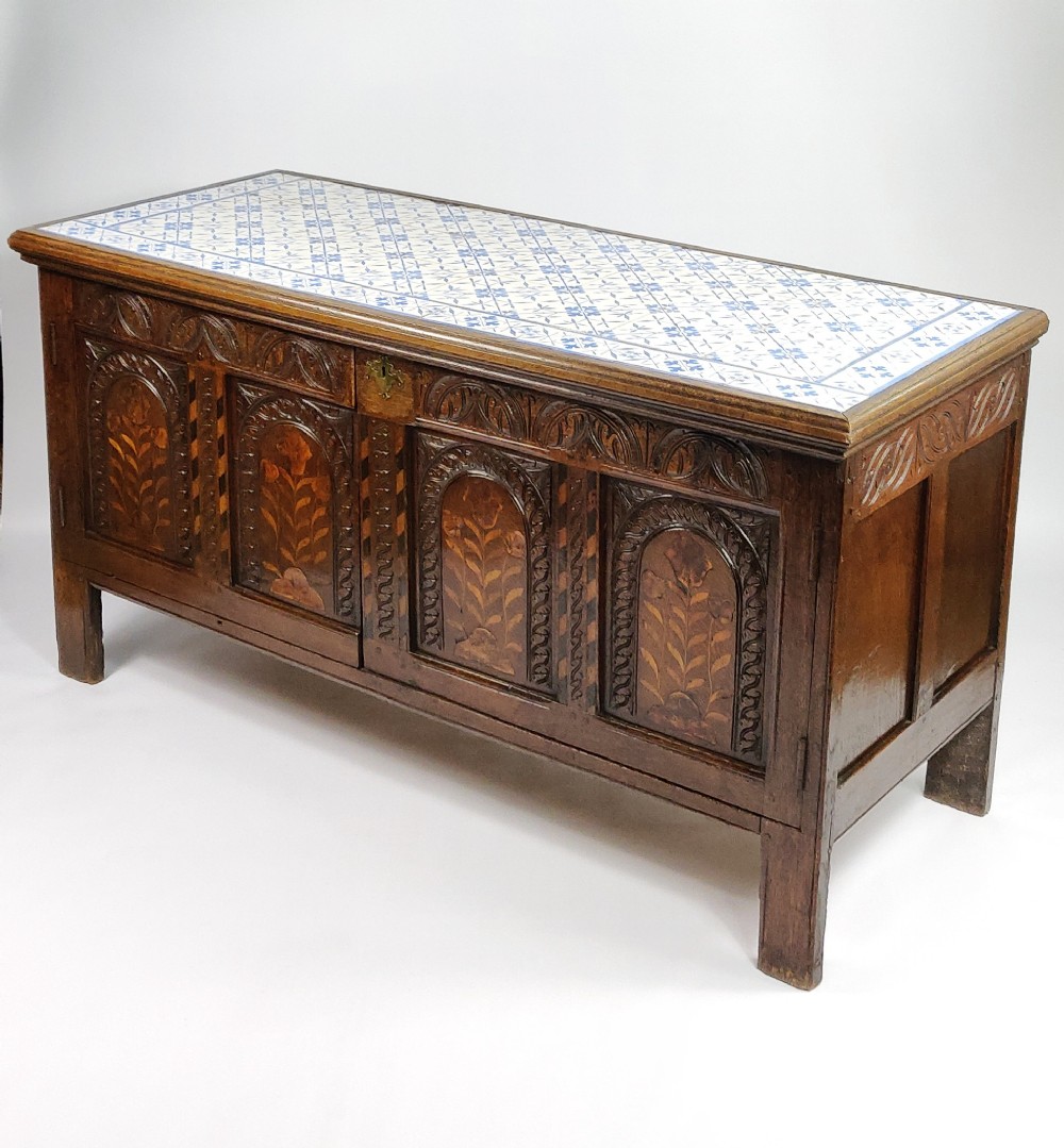 A decorative 17th century converted inlaid oak coffer.
