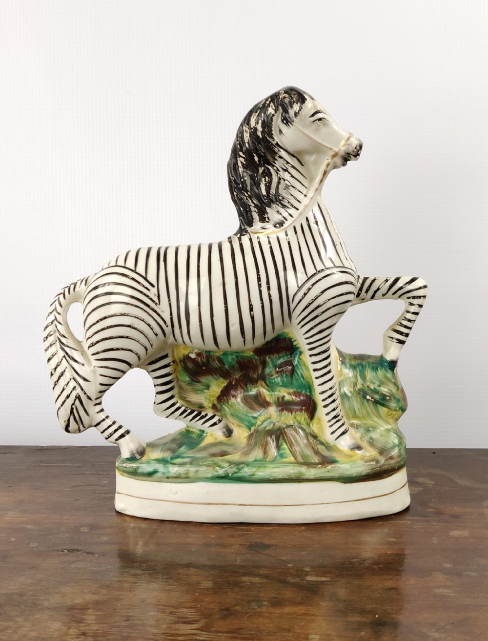 a 19th century Staffordshire zebra. 
