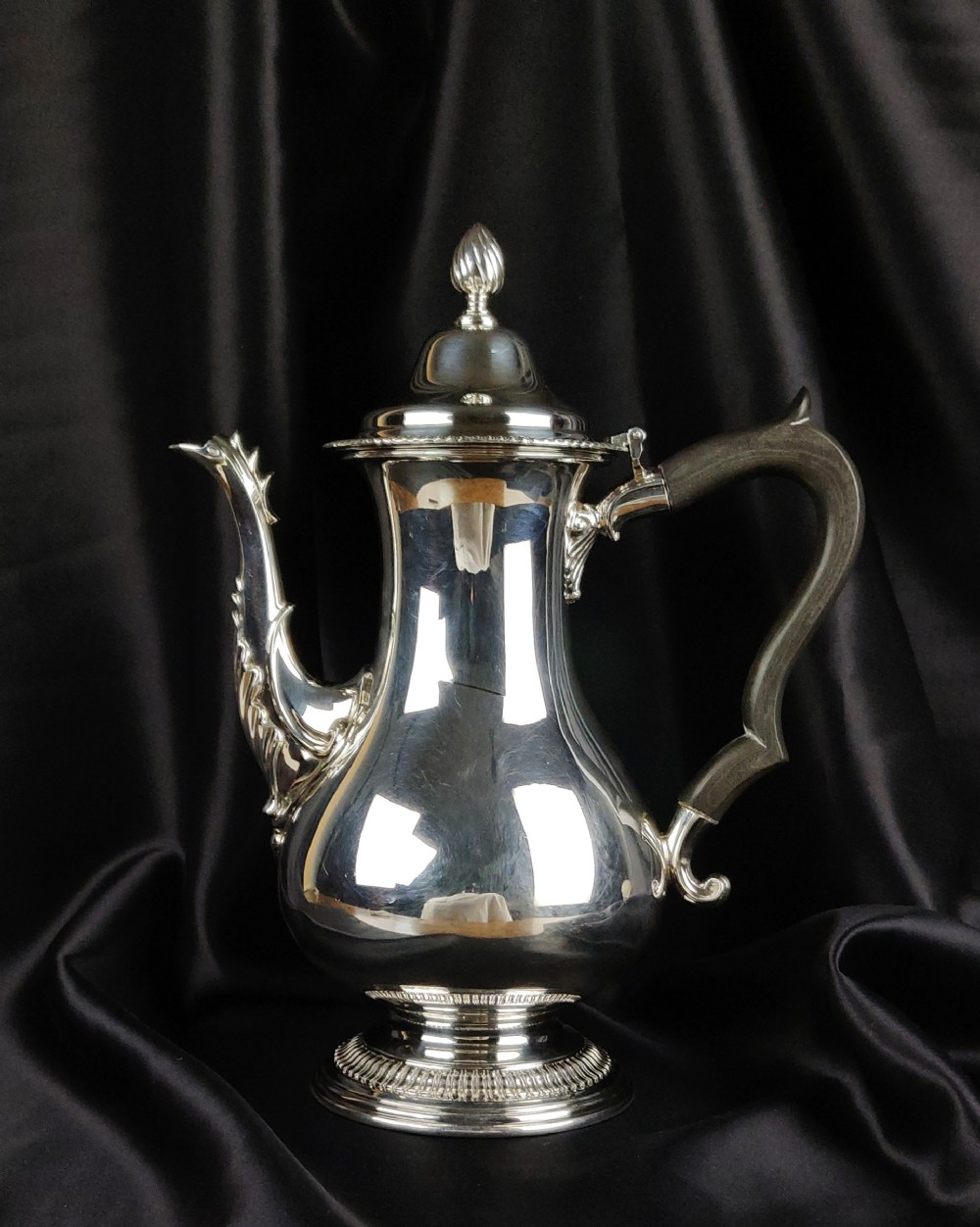 A high quality George III style silver coffee pot. 