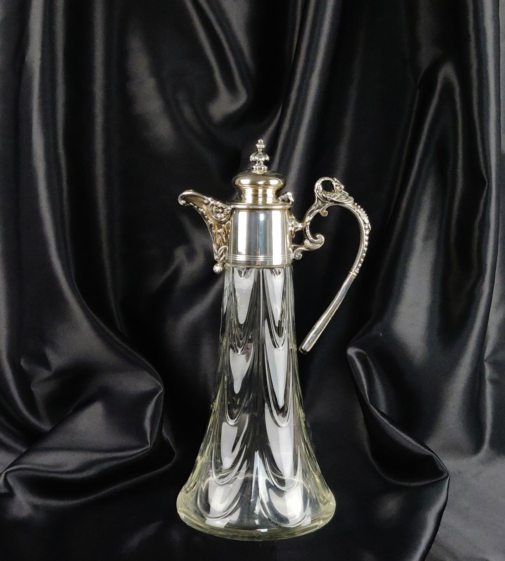 A silver plated claret jug Circa 1900.