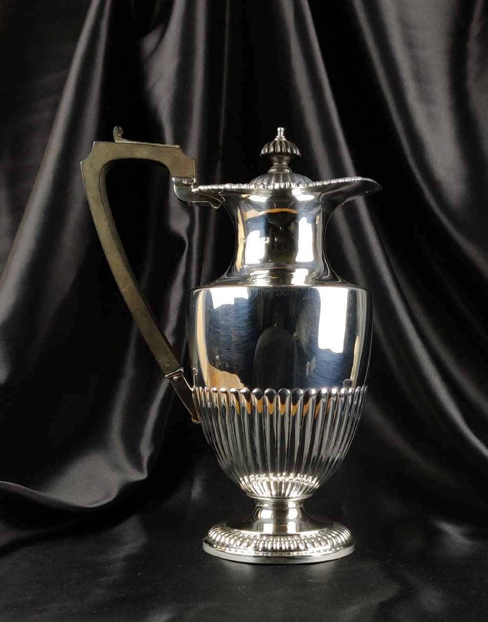 An Edwardian silver coffee pot made by Elkington & Co.