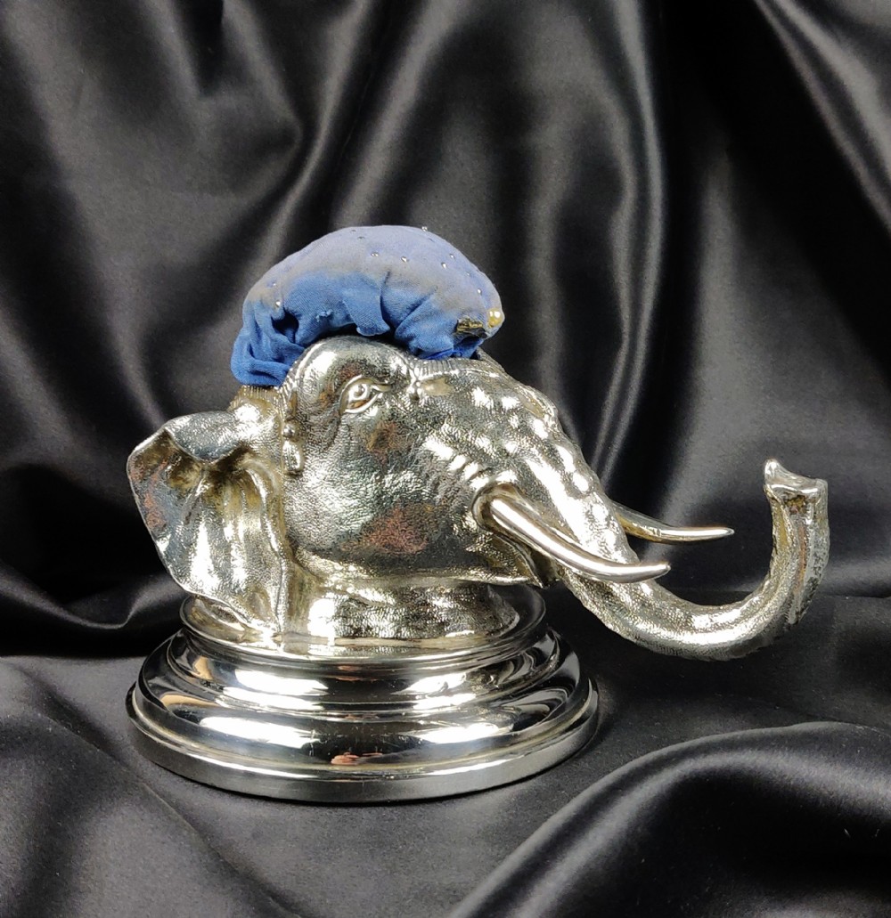A silver plated elephant pin cushion by Lee and Wigfull. 
