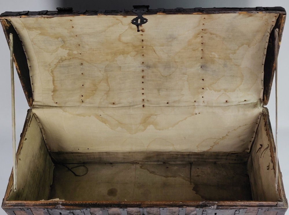 A large early 17th century iron bound chest.  View XVIII
