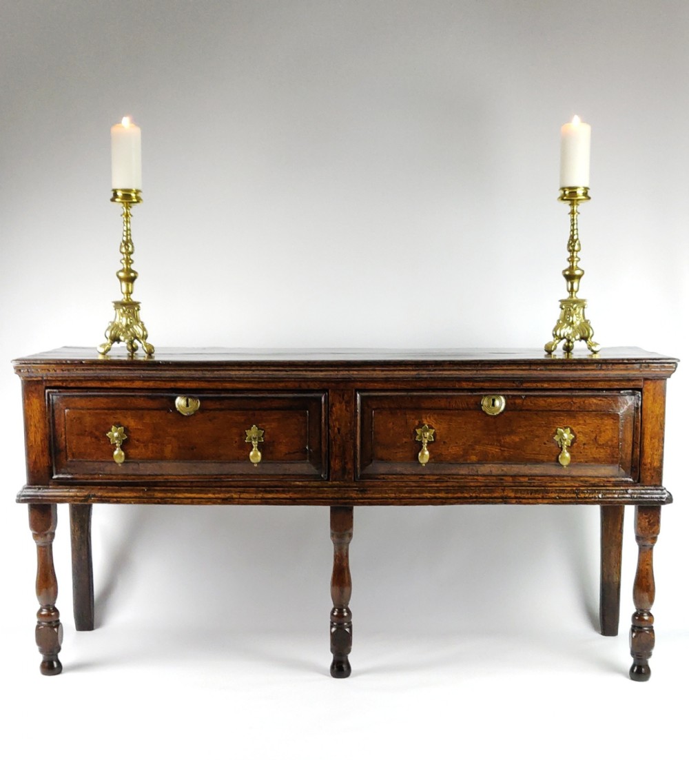 An unusually small dresser base Circa 1700. 