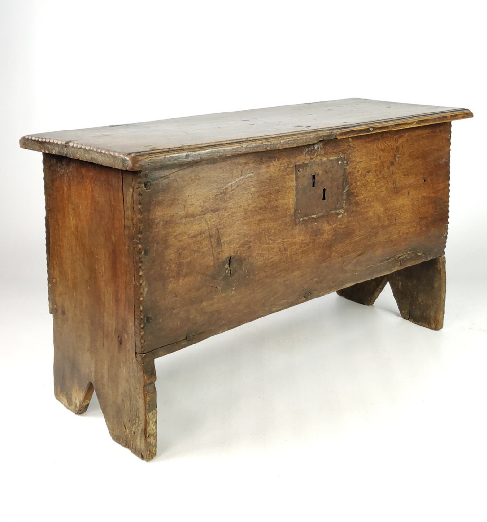 A small 17th century oak plank coffer.