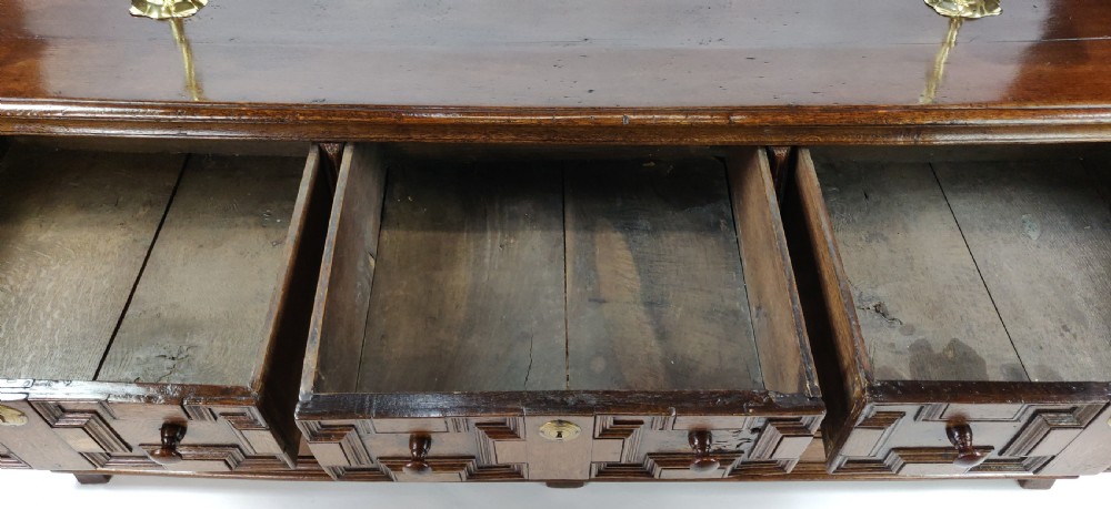 A fabulous late 17th century enclosed dresser base.  View XII