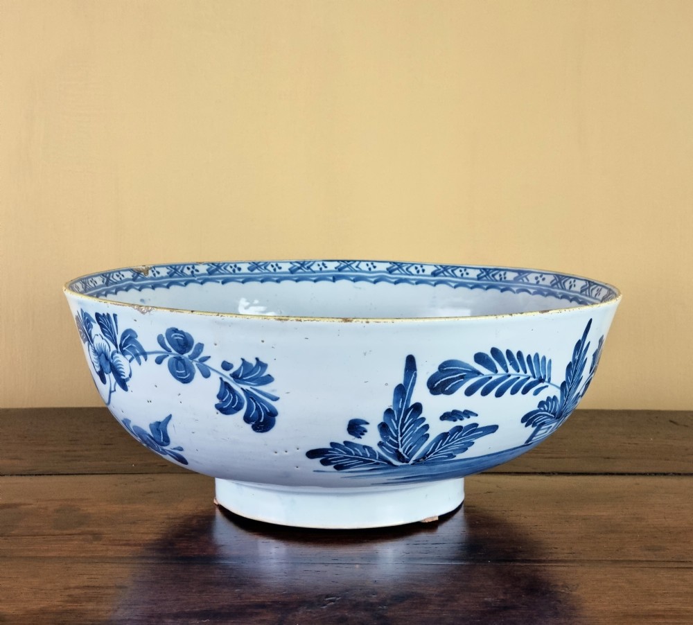 A large 18th century English delft punch bowl.  View III