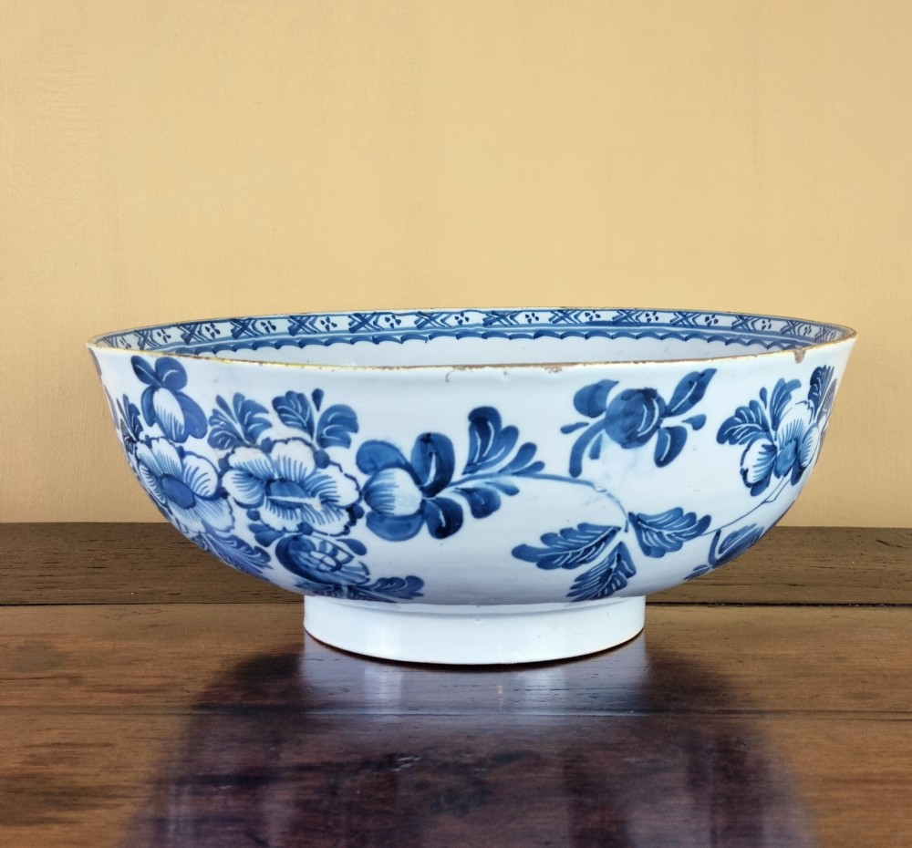 A large 18th century English delft punch bowl.  View V