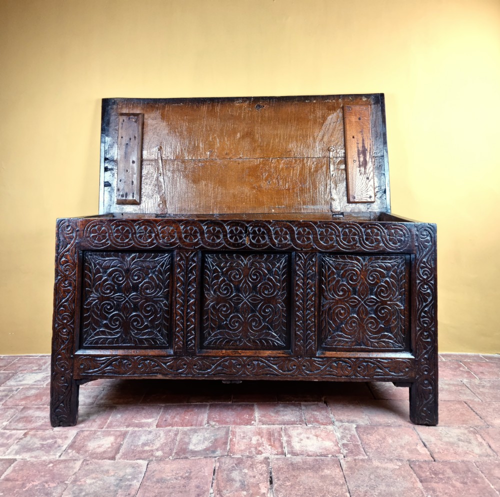 A 17th century carved oak coffer.  View V