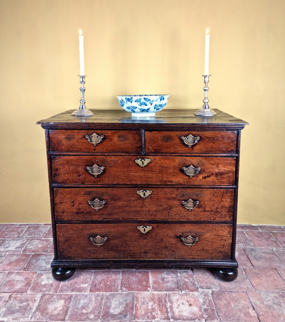 An 18th century walnut chest of drawers. 