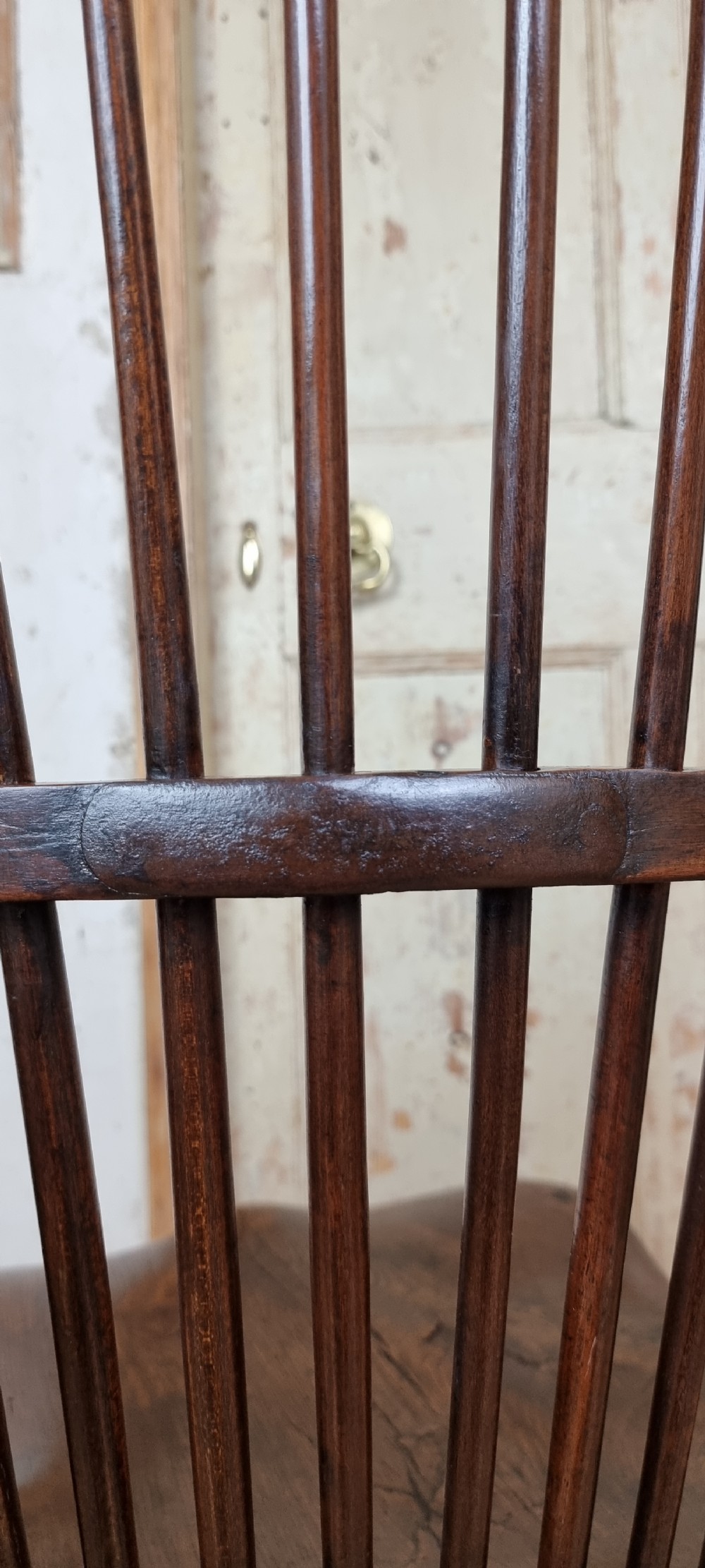 A late 18th century walnut windsor chair.  View X