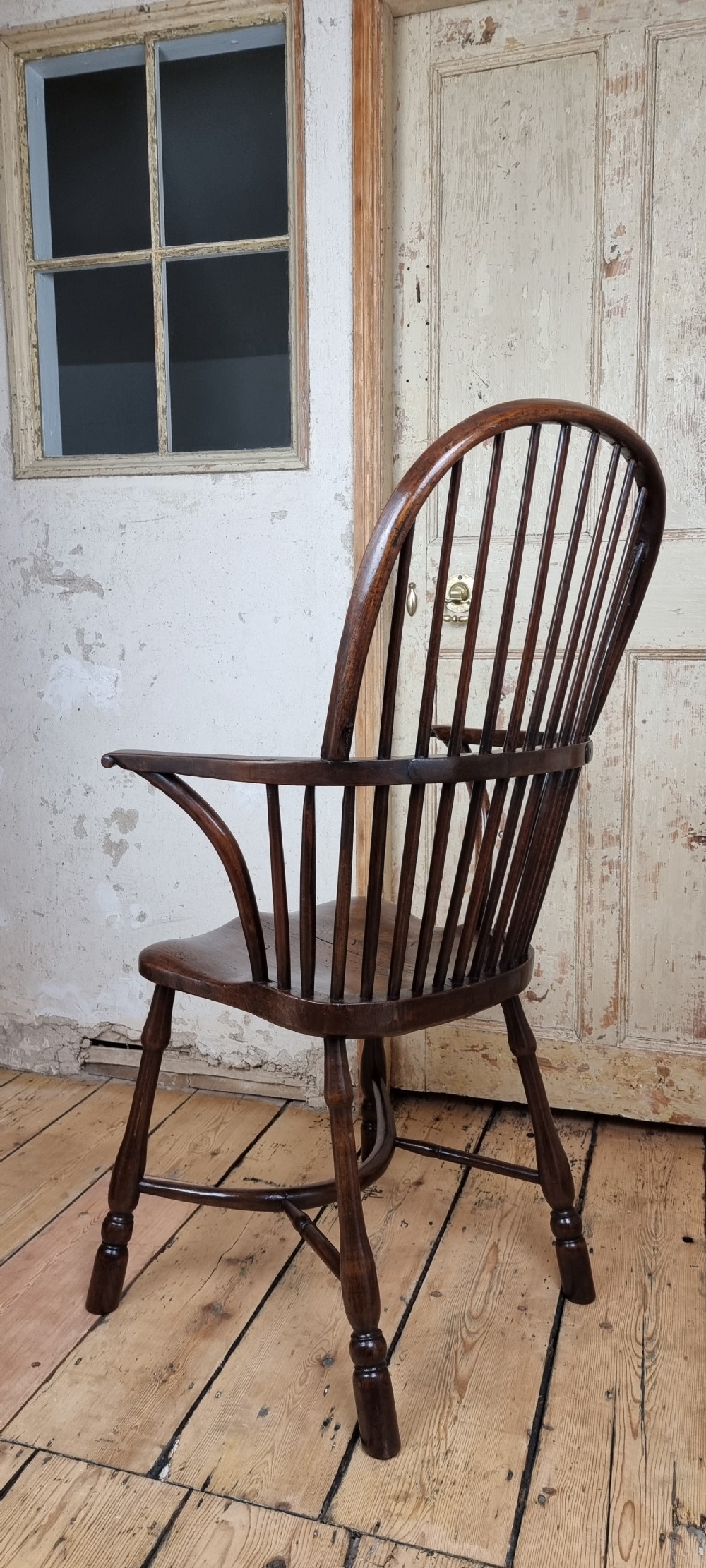 A late 18th century walnut windsor chair.  View XX