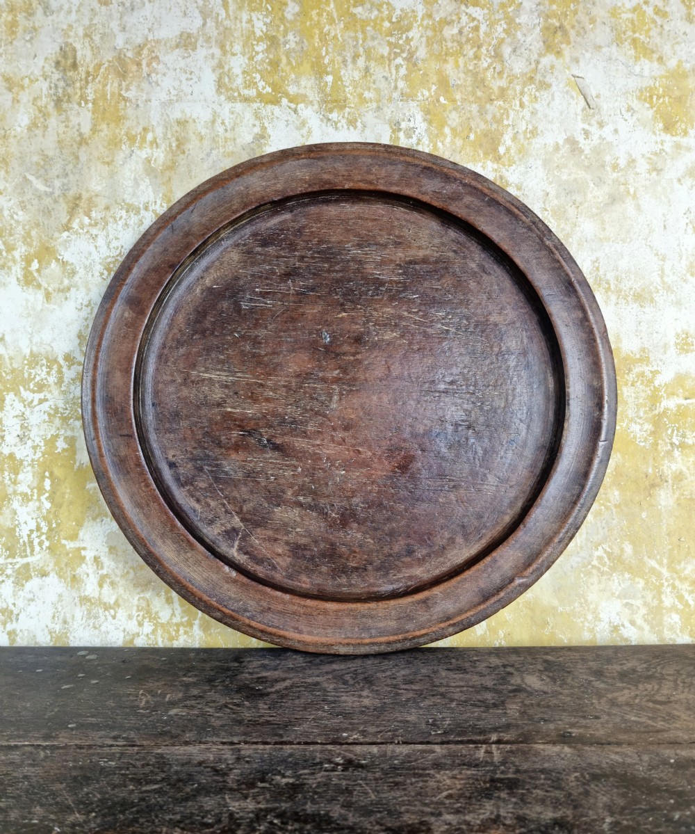 A large 19th century treen platter. 