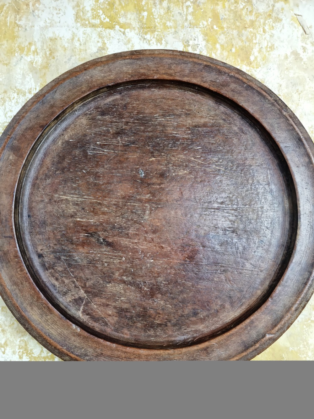 A large 19th century treen platter.  View II