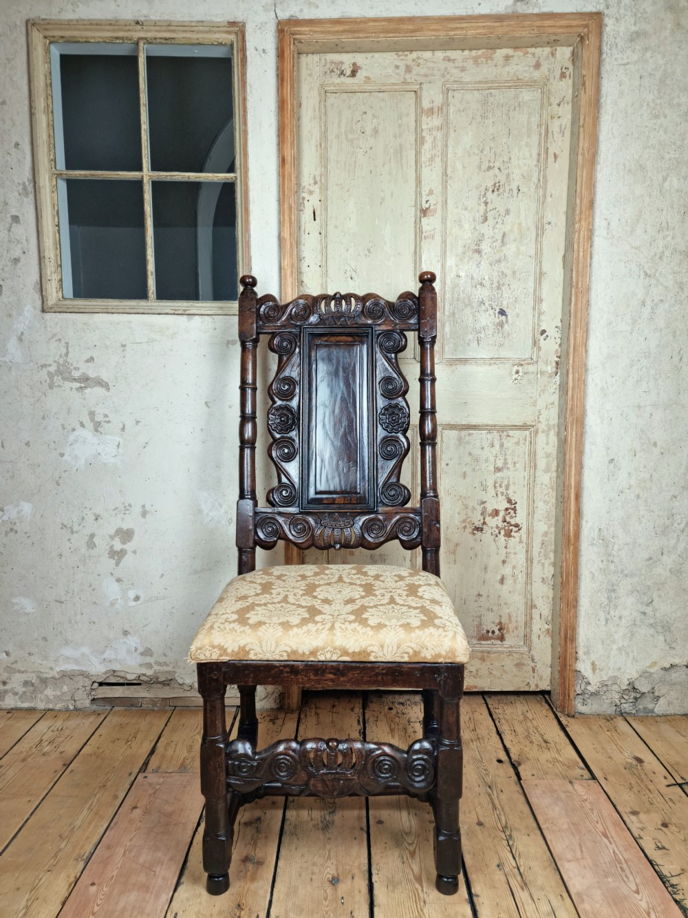 A late 17th century hall chair.  View III