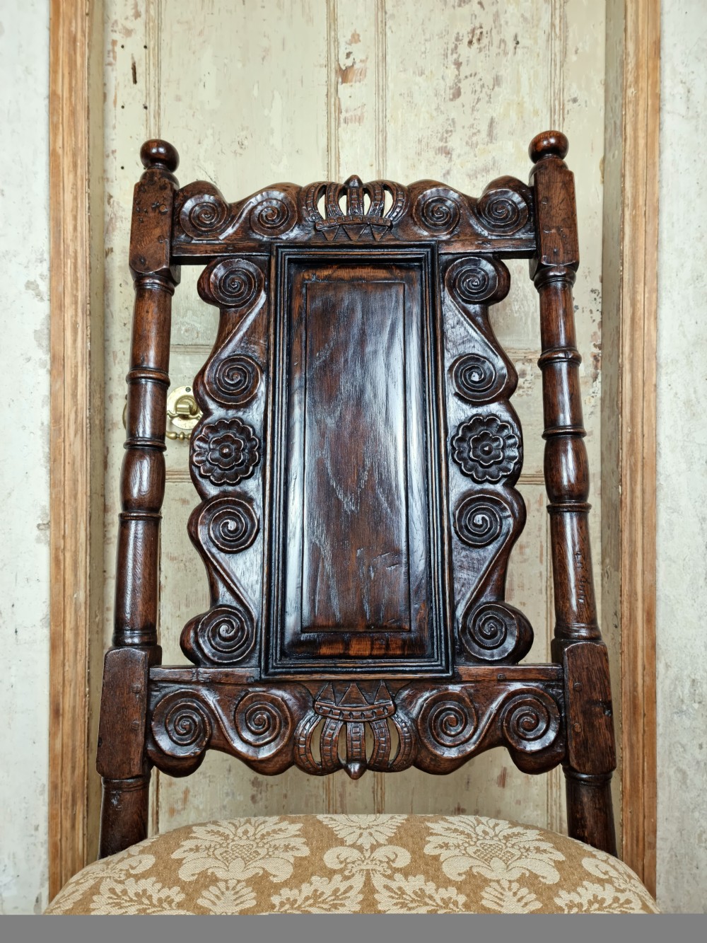 A late 17th century hall chair.  View IV