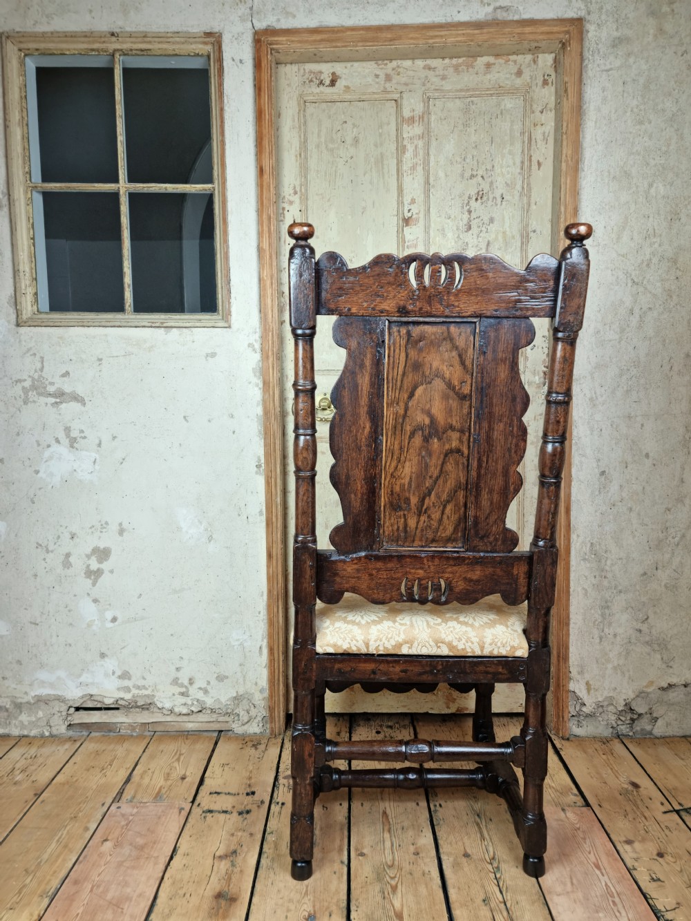 A late 17th century hall chair.  View VI