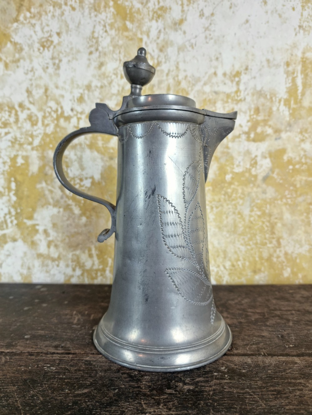 A 19th century wriggle work tankard. 
