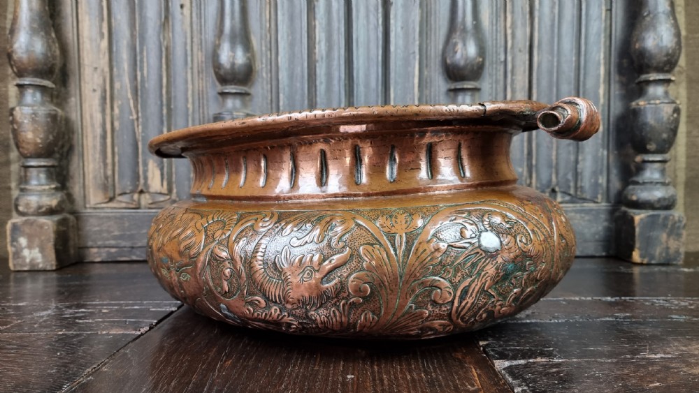 A large late 17th century repousse wine cooler.  View V
