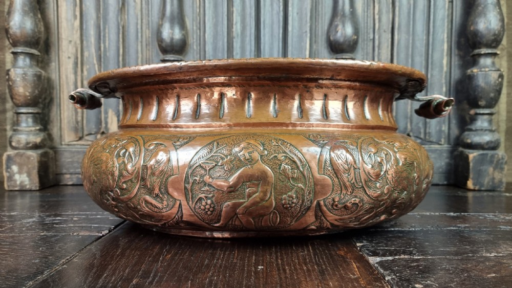 A large late 17th century repousse wine cooler.  View VII