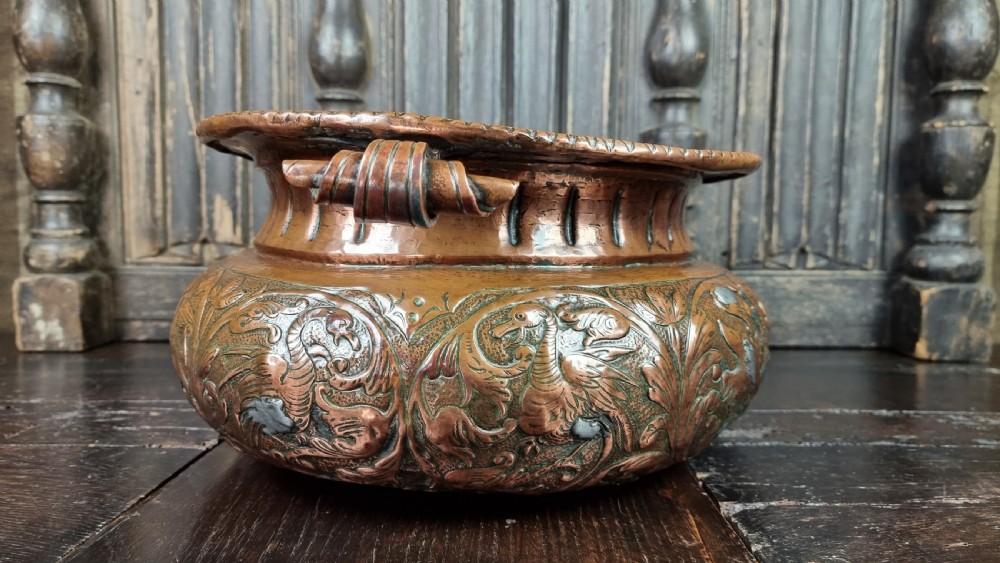 A large late 17th century repousse wine cooler.  View X