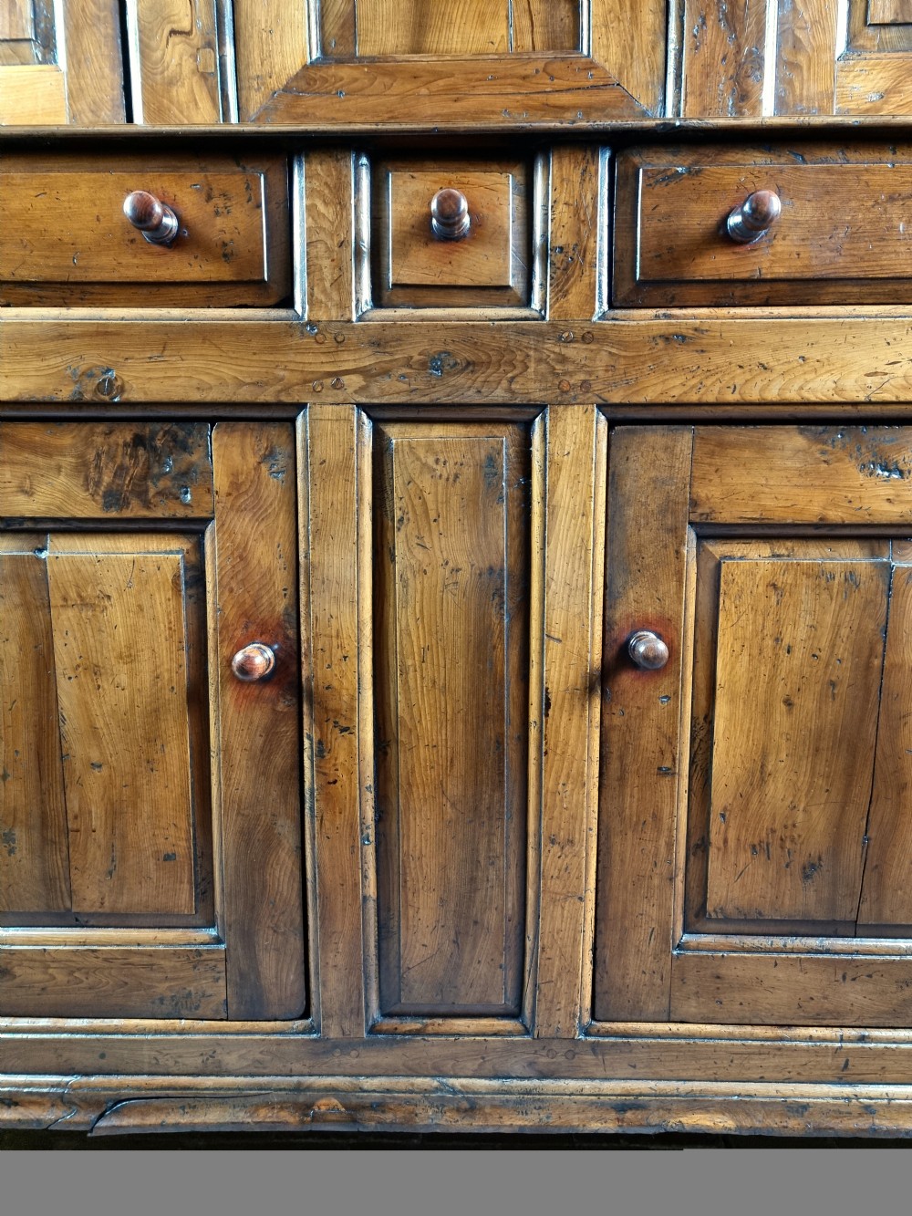 A rare mid 18th century yew wood tridarn.  View V