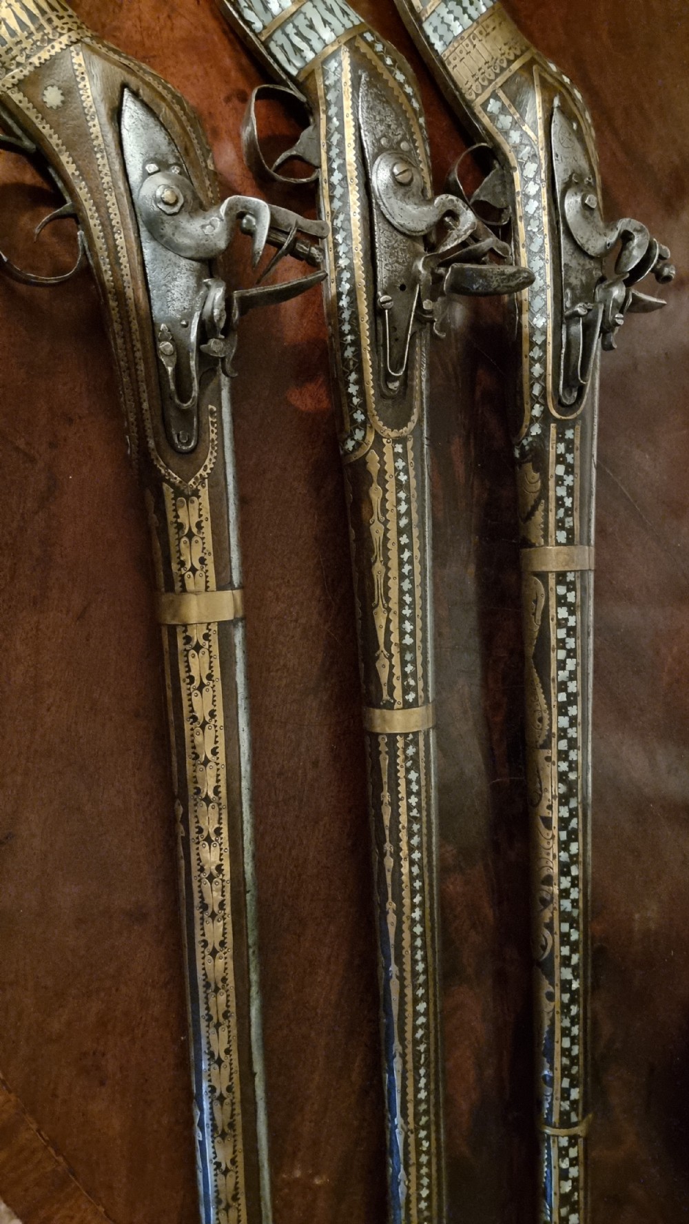 Three north western frontier flintlock muskets.  View III