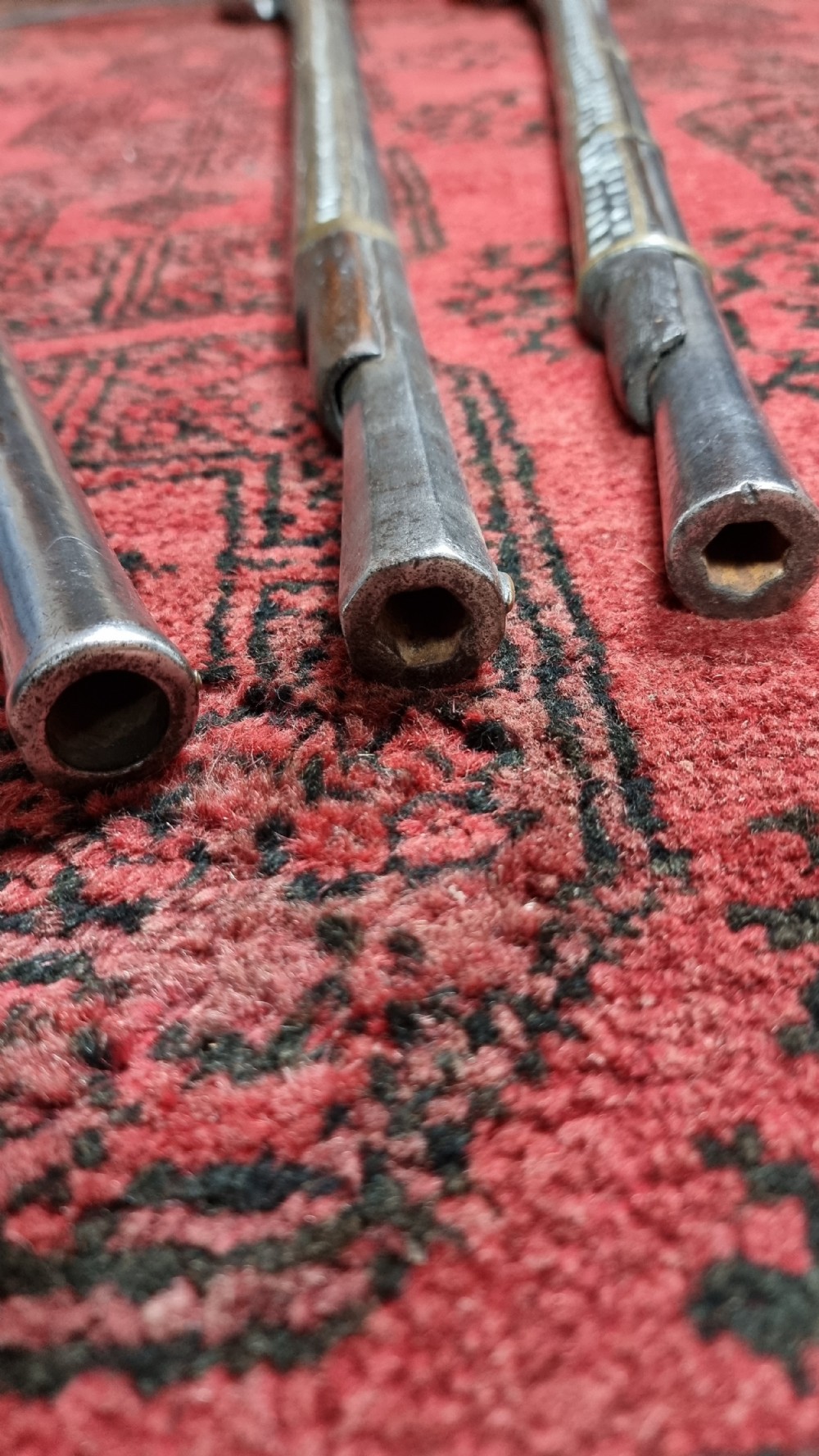 Three north western frontier flintlock muskets.  View VIII