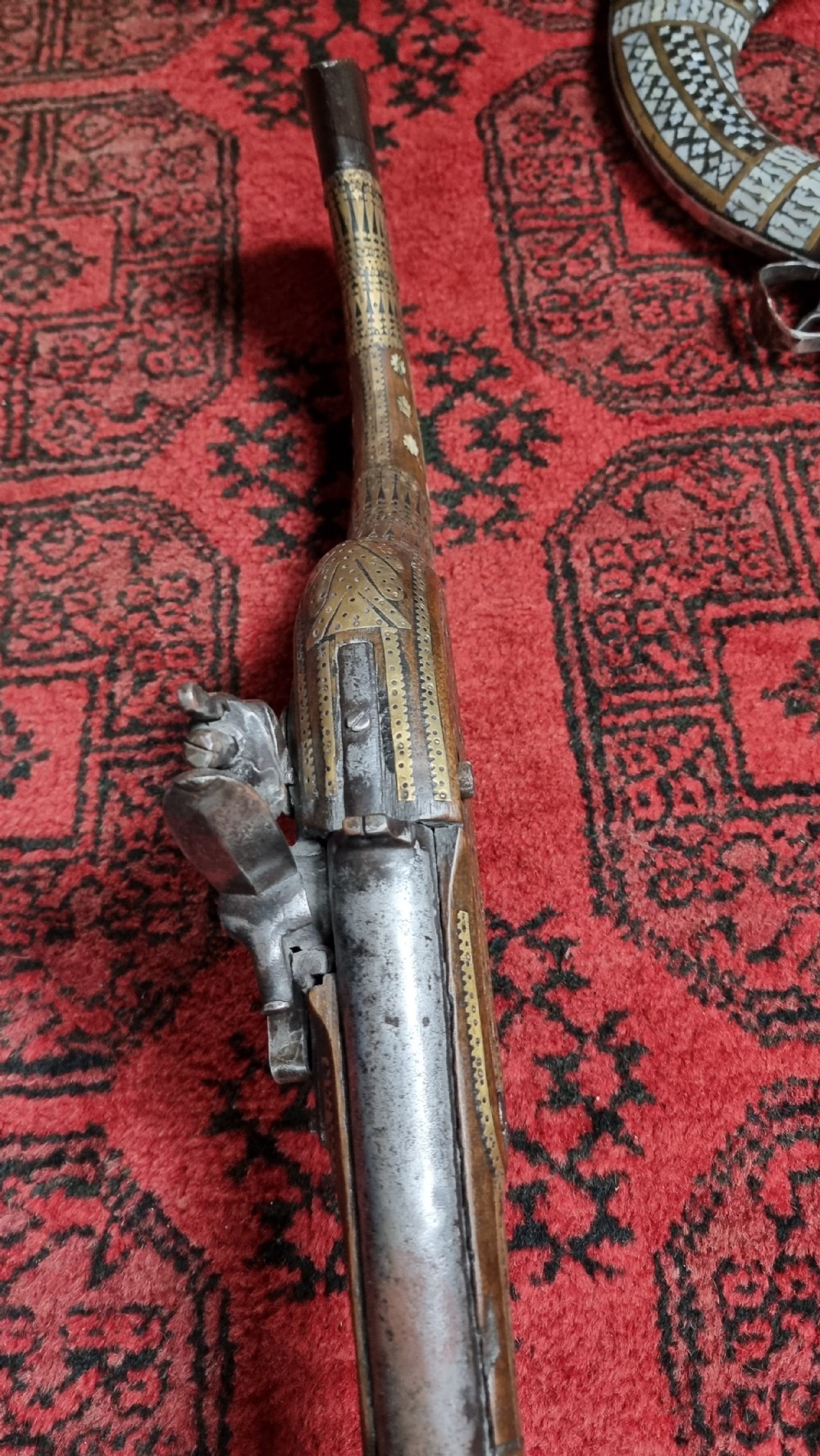 Three north western frontier flintlock muskets.  View X
