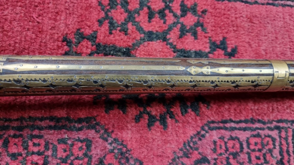 Three north western frontier flintlock muskets.  View XIII