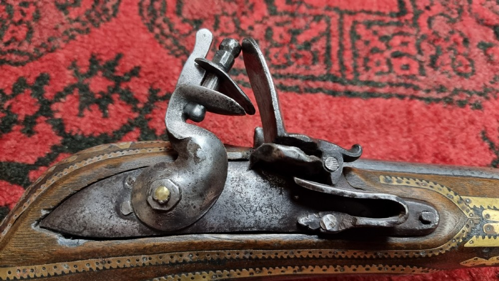 Three north western frontier flintlock muskets.  View XV