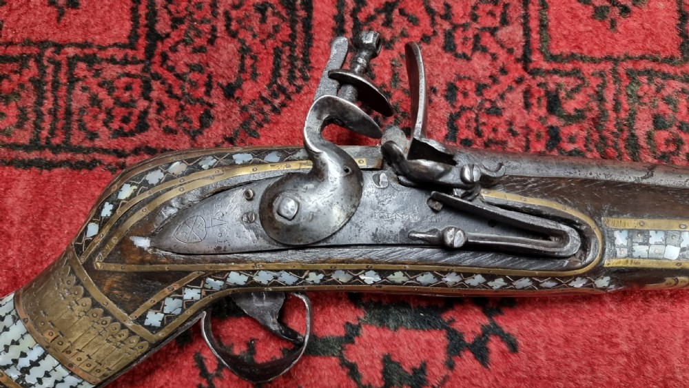 Three north western frontier flintlock muskets.  View XXII