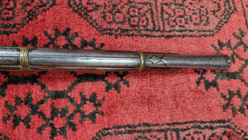 Three north western frontier flintlock muskets.  View XXIV
