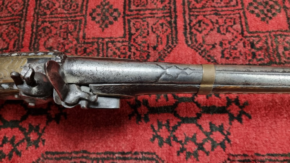 Three north western frontier flintlock muskets.  View XXV