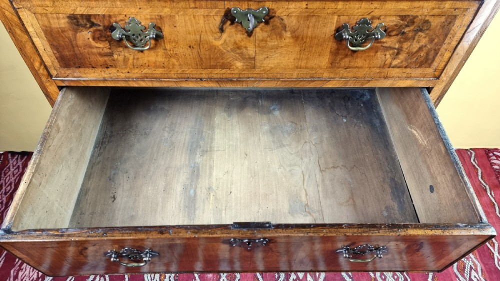 An early 18th century walnut chest on stand. View X