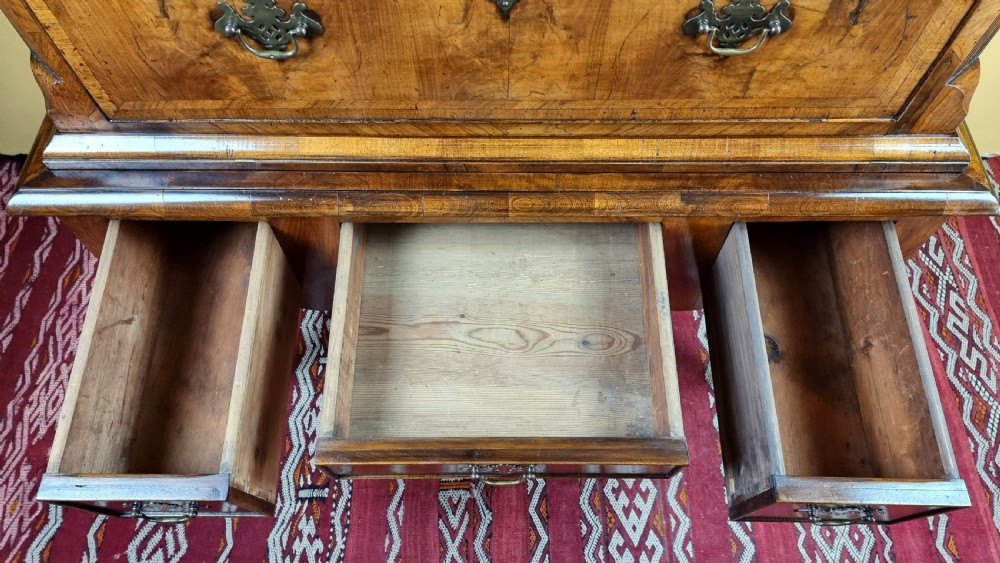 An early 18th century walnut chest on stand. View XI