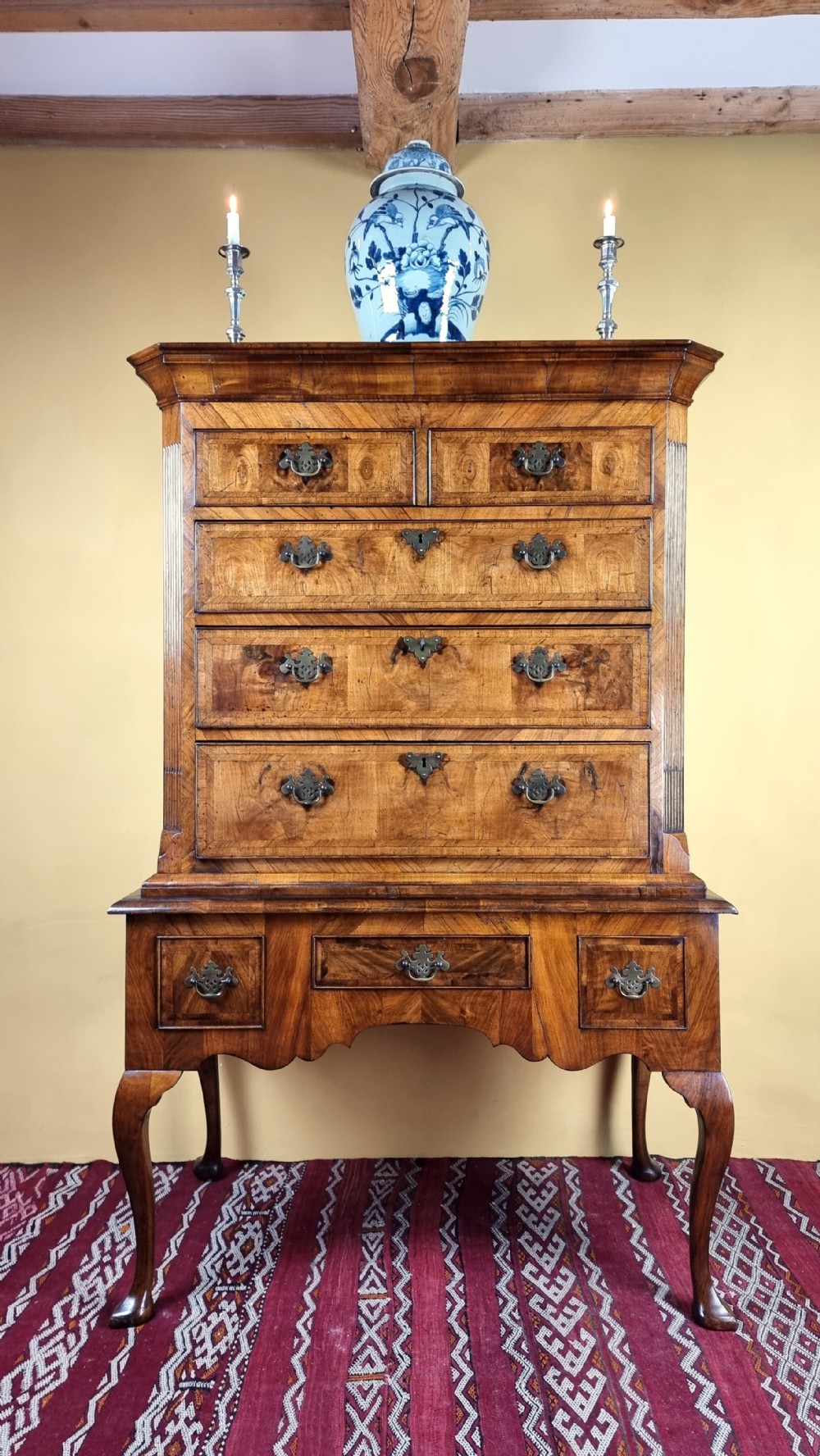 An early 18th century walnut chest on stand.