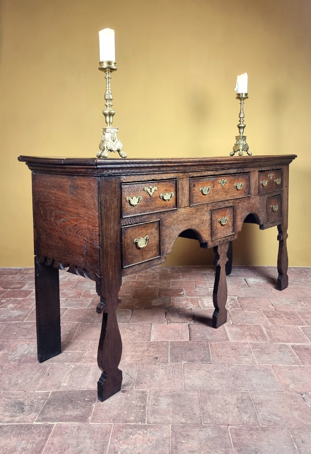 A fine George 1st low open dresser base. 