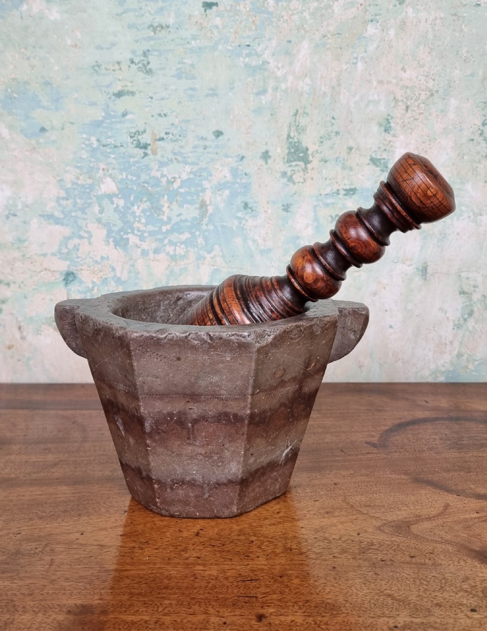 A 17th century marble mortar and pestle.